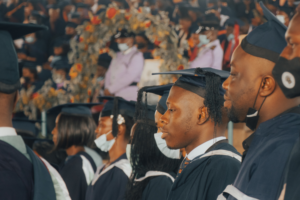 African university graduates in academic gowns at a commencement ceremony