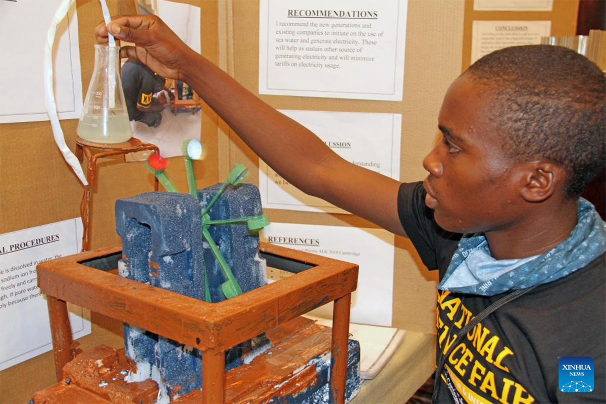 African students competing in a Pan-African Robotics Competition, showcasing innovation and teamwork