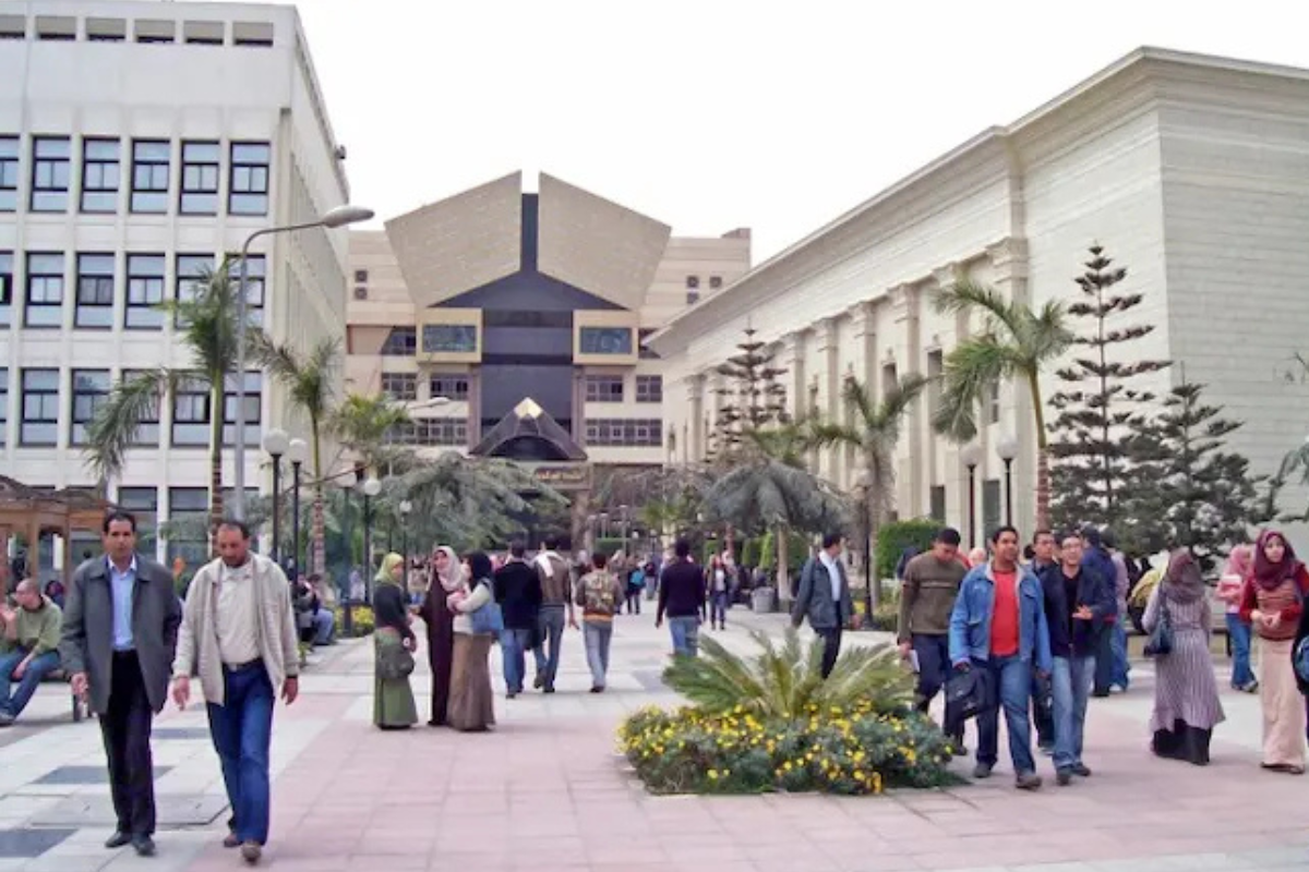 Students walking across a university campus in Egypt