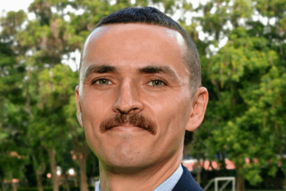 Jamel Badaoui Head of Primary at St Constantines International School in Tanzania standing outdoors on school grounds