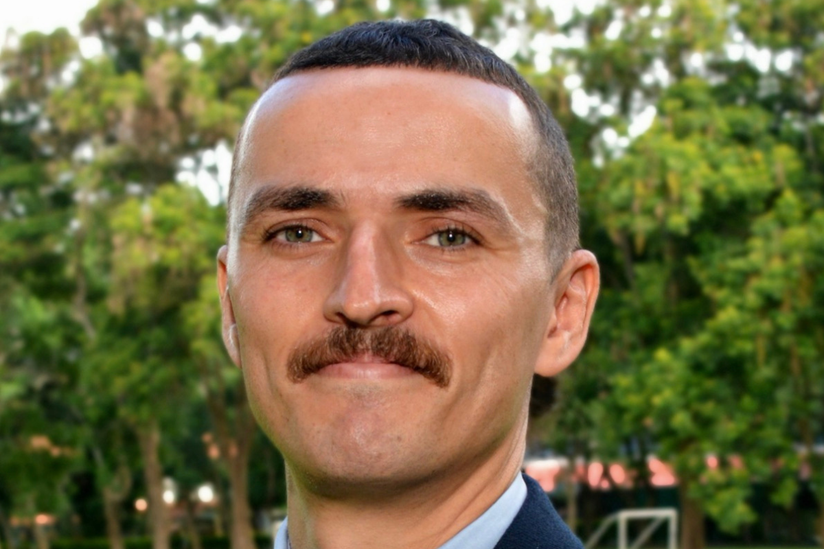 Jamel Badaoui Head of Primary at St Constantines International School in Tanzania standing outdoors on school grounds