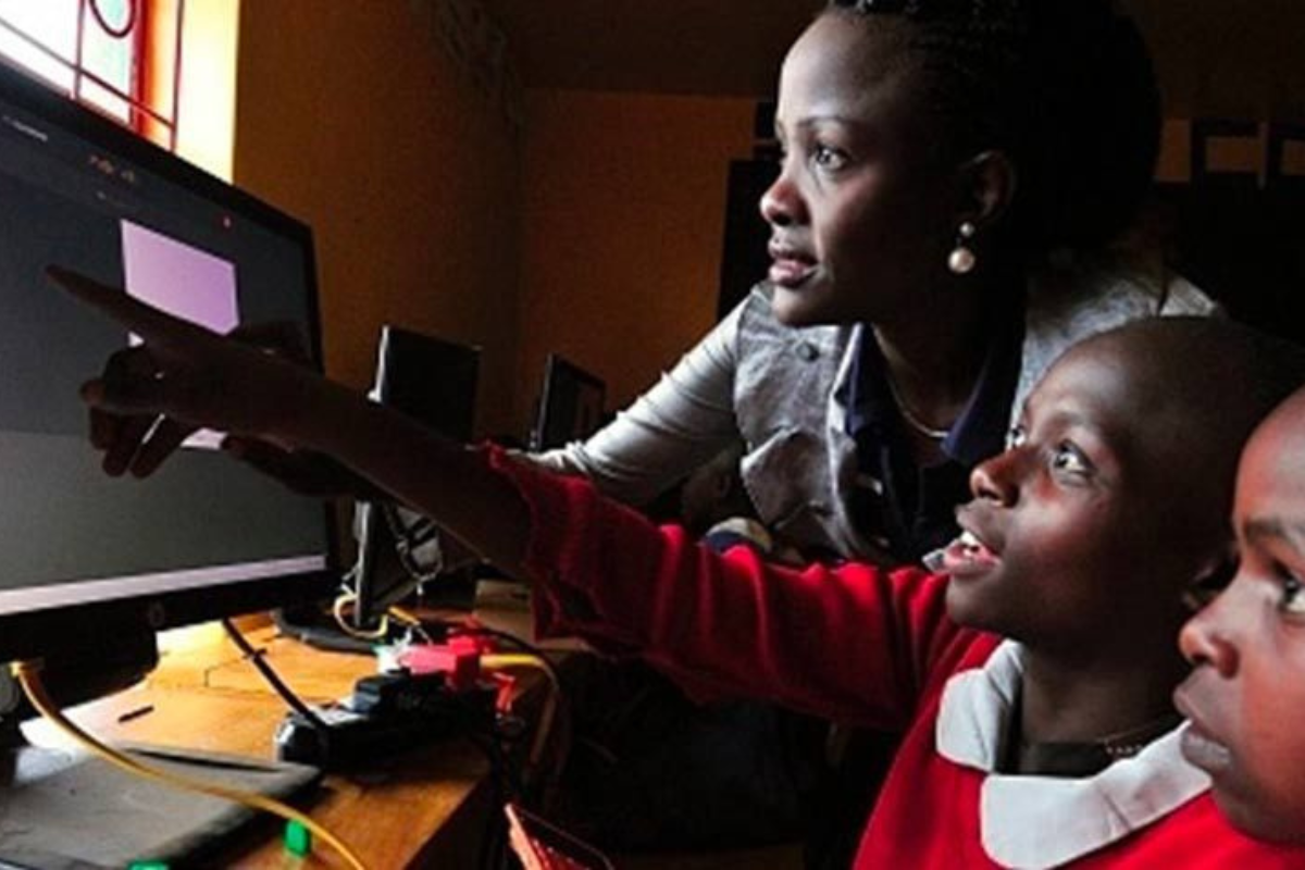 Kenyan students learning digital literacy and computer skills in school
