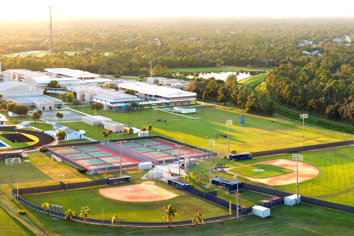 Aerial view of a large private school campus with sports facilities in Nigeria