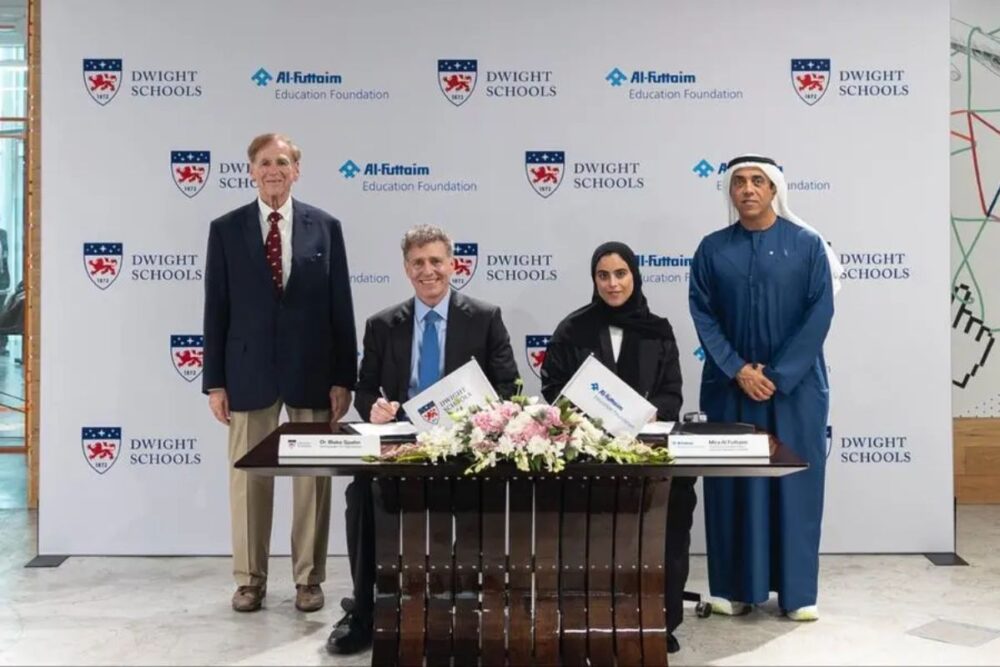 Dr Blake Spahn and Mira Al Futtaim sign the agreement to establish Dwight School Cairo, joined by leaders from both organisations.