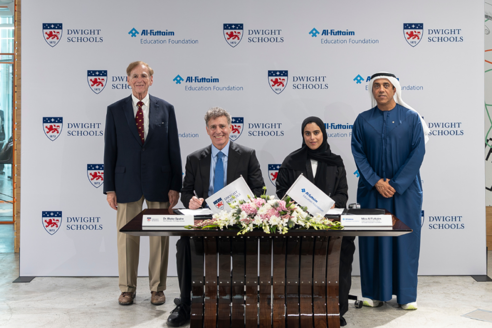 Dr Blake Spahn and Mira Al Futtaim sign the agreement to establish Dwight School Cairo, joined by leaders from both organisations.
