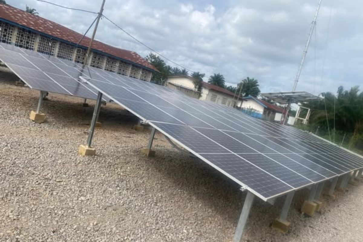 Liberian students engaging in digital learning in a newly built classroom.