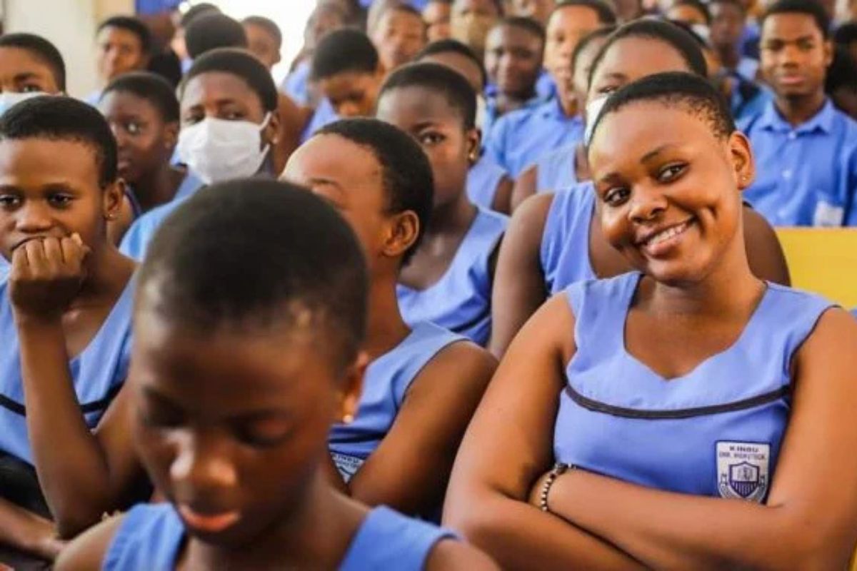Parents and students in Ghana celebrating access to Free SHS in private schools