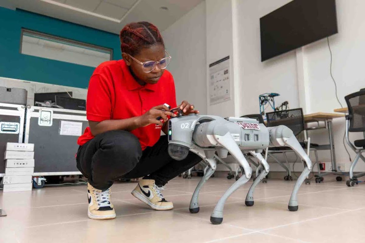 Students working on AI and robotics projects at CMU Africa