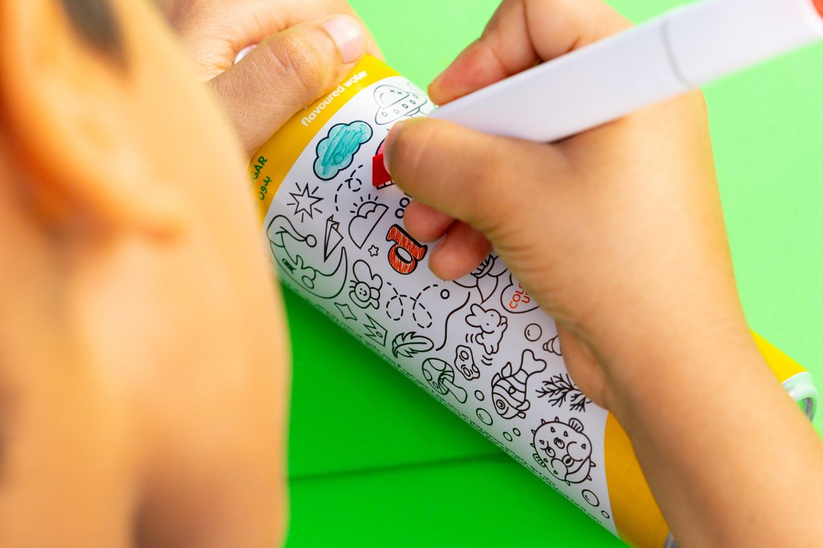 Creative doodle-ready packaging of Oodles of Doodles drinks