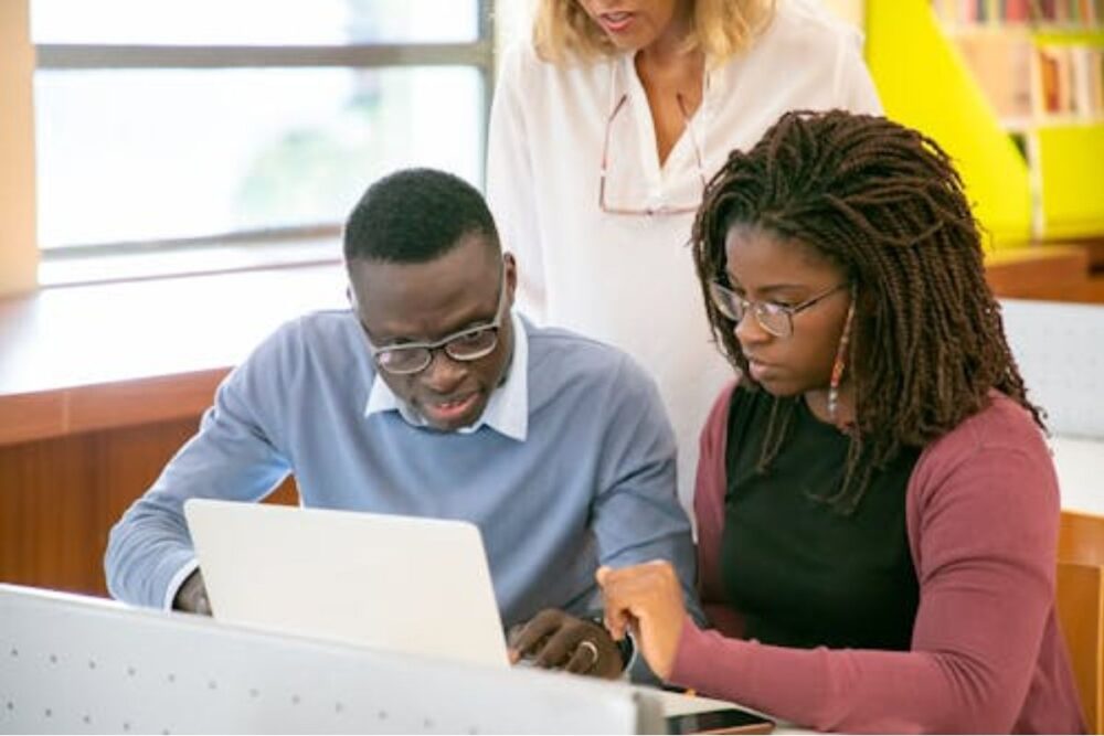 African university lecturer teaching students in a classroom