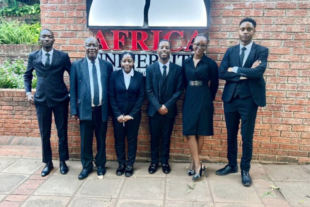 Africa University School of Law team celebrating victory at Price Media Law Moot African Round