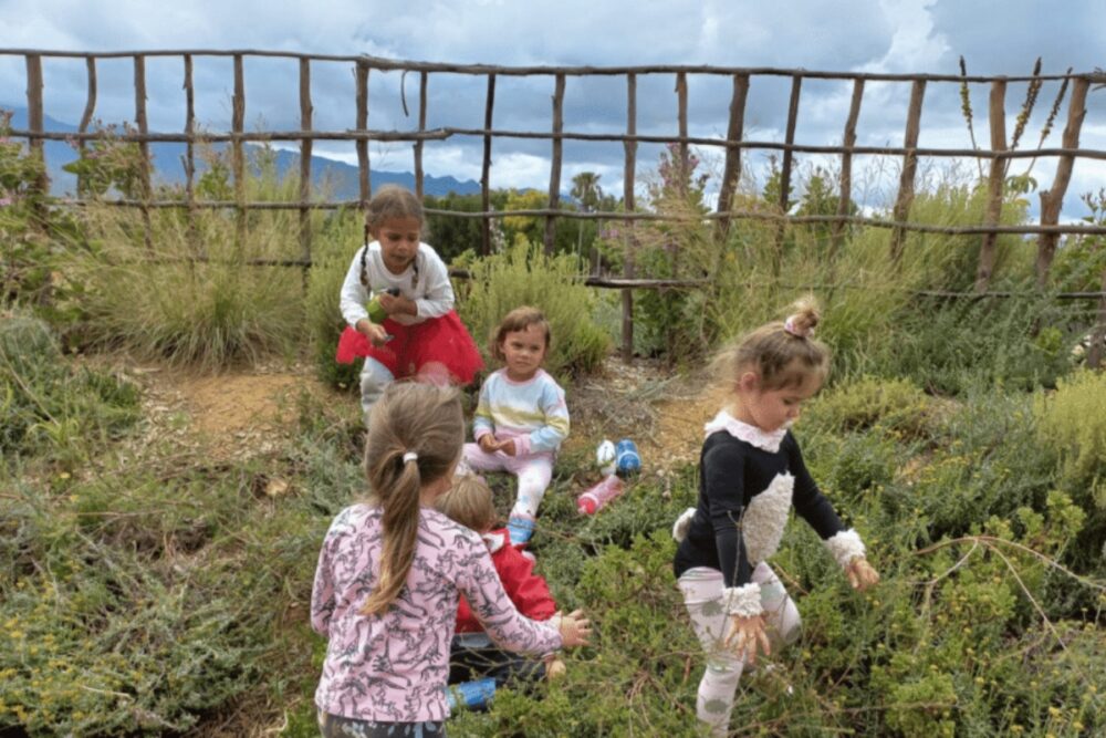 Students learning outdoors at Green School South Africa through sustainability and practical education