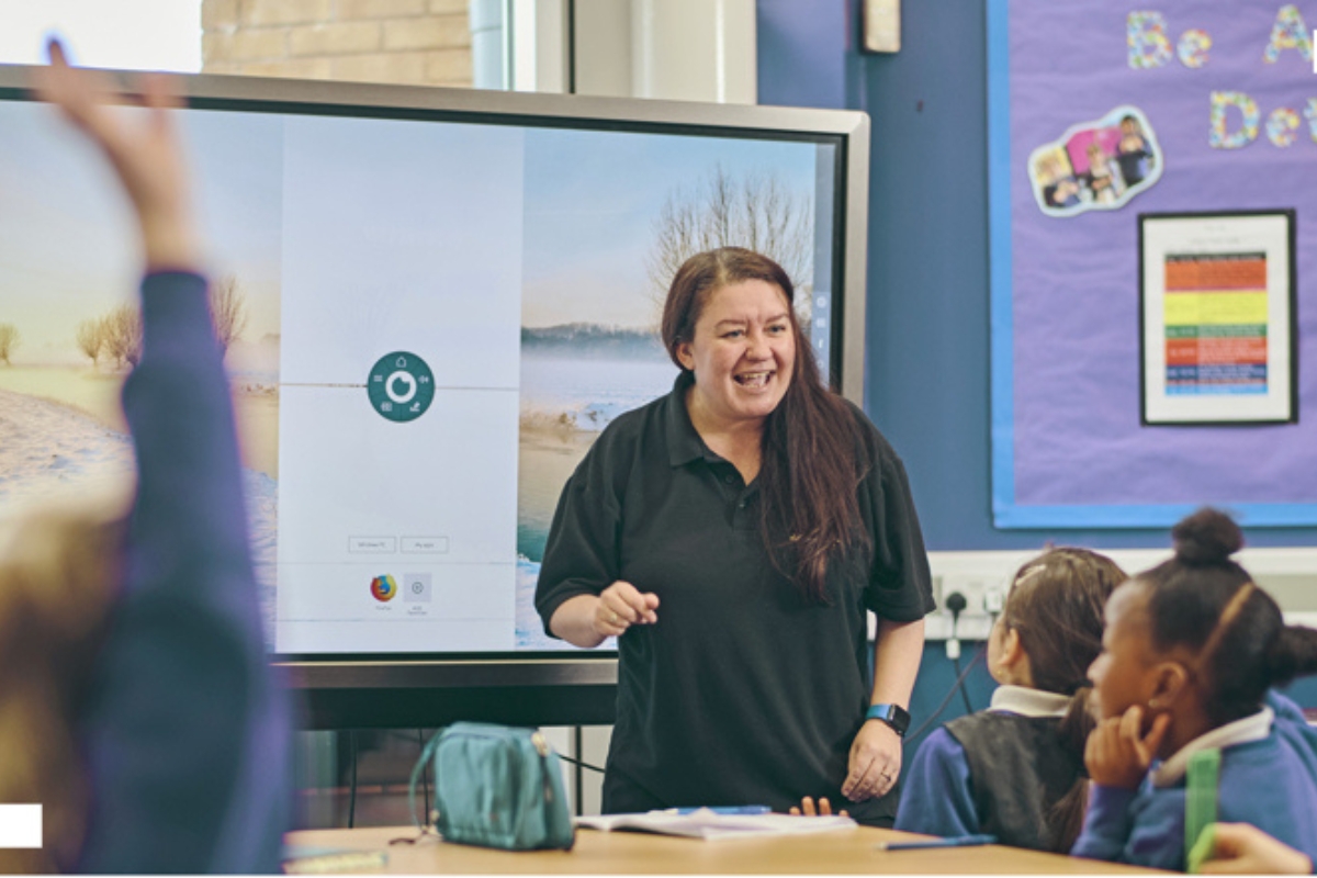 Teachers using Hachette Learning resources in a classroom to support teaching and learning